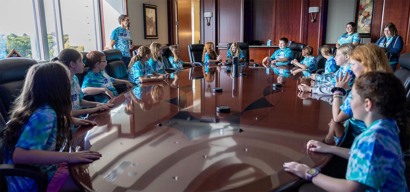 Group of School Sense students at a large table