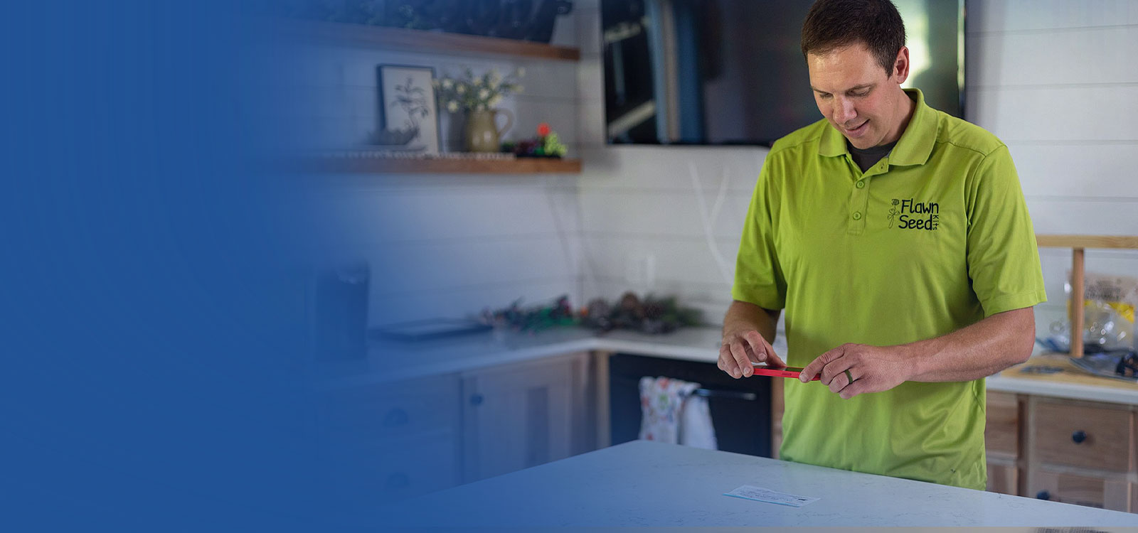 Business owner and Member of RCU depositing a checking using his mobile phone