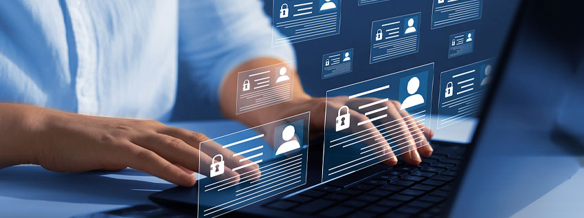 Person on a laptop with icons floating over the image