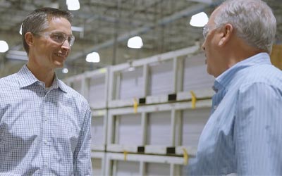 RCU Member working with owners of a business