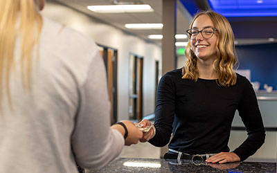 Team member working with a Member