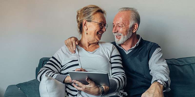 Senior couple on a tablet