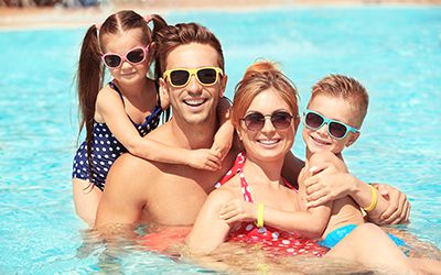 family in pool