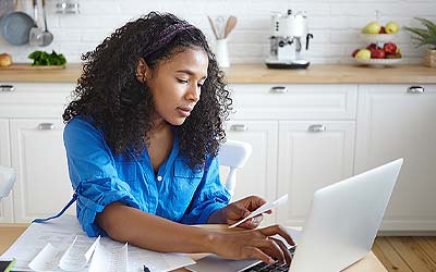 Young lady working on finances