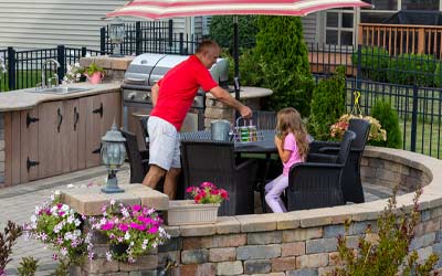 Family grilling on patio