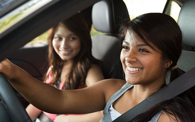 Teenagers driving in car