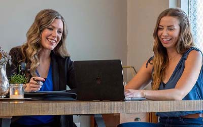 Two women meeting about education