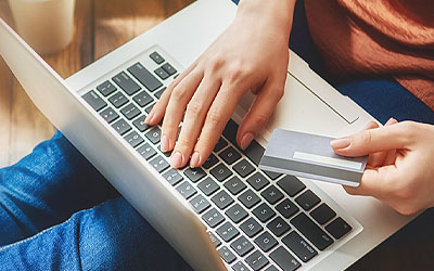 Man using banking on laptop