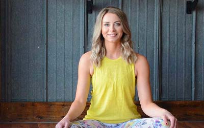 Woman doing yoga in studio