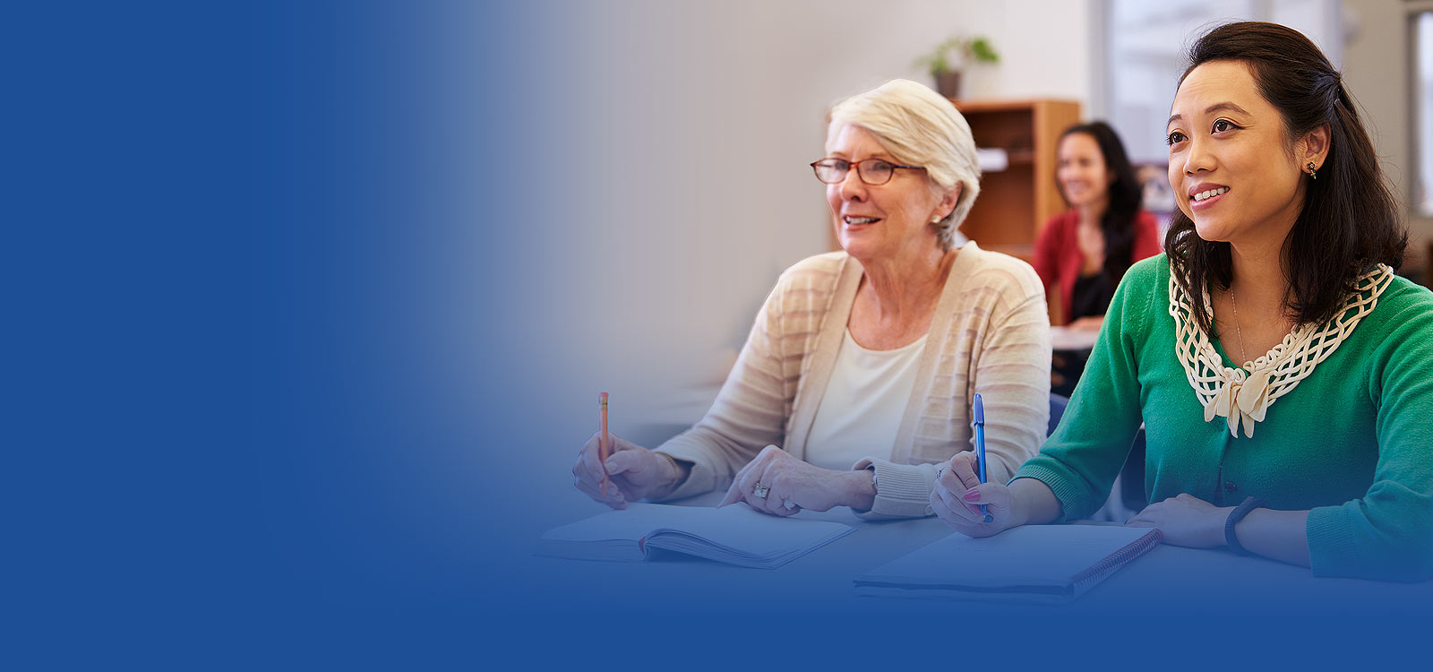 Two women learning about financing