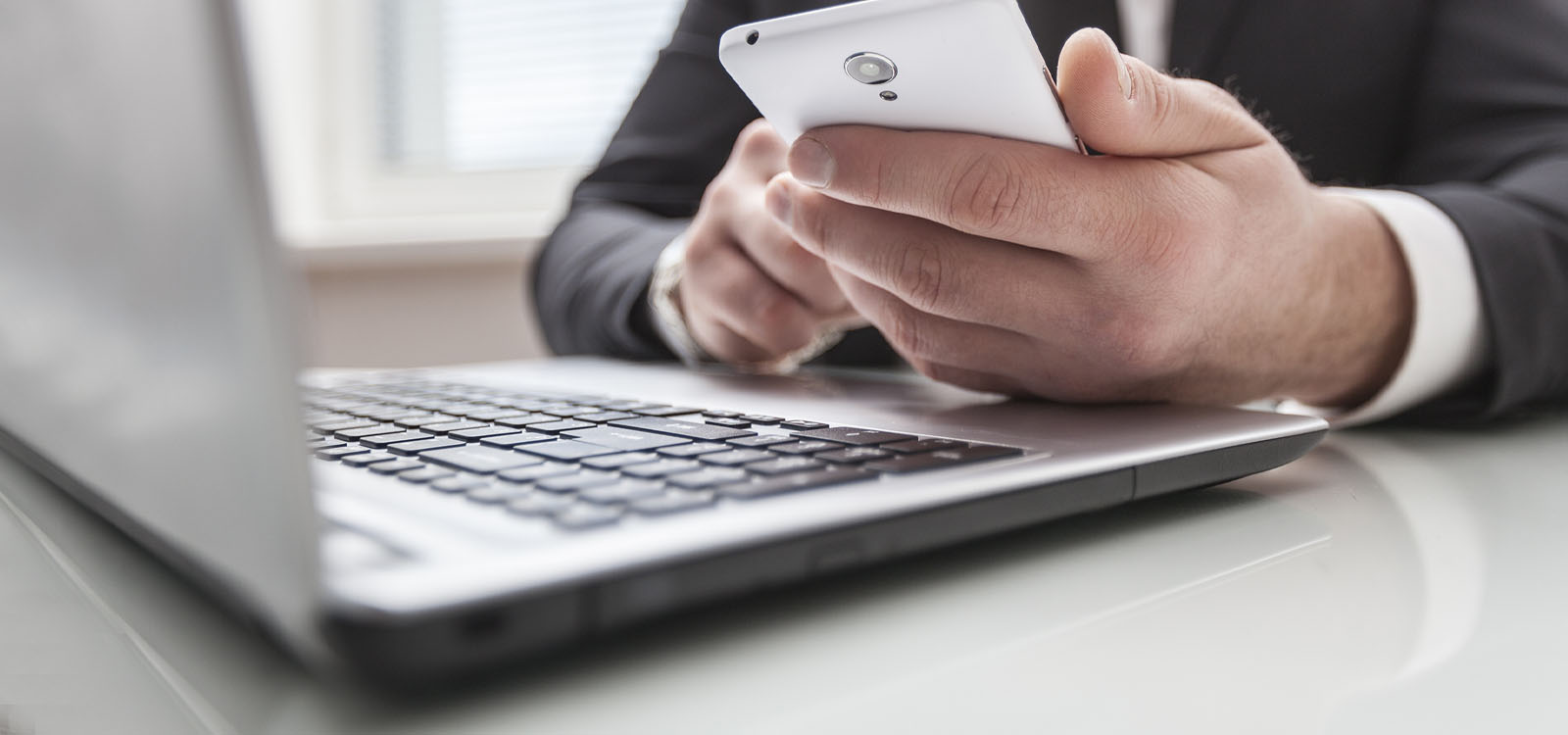 Man using his phone to bank