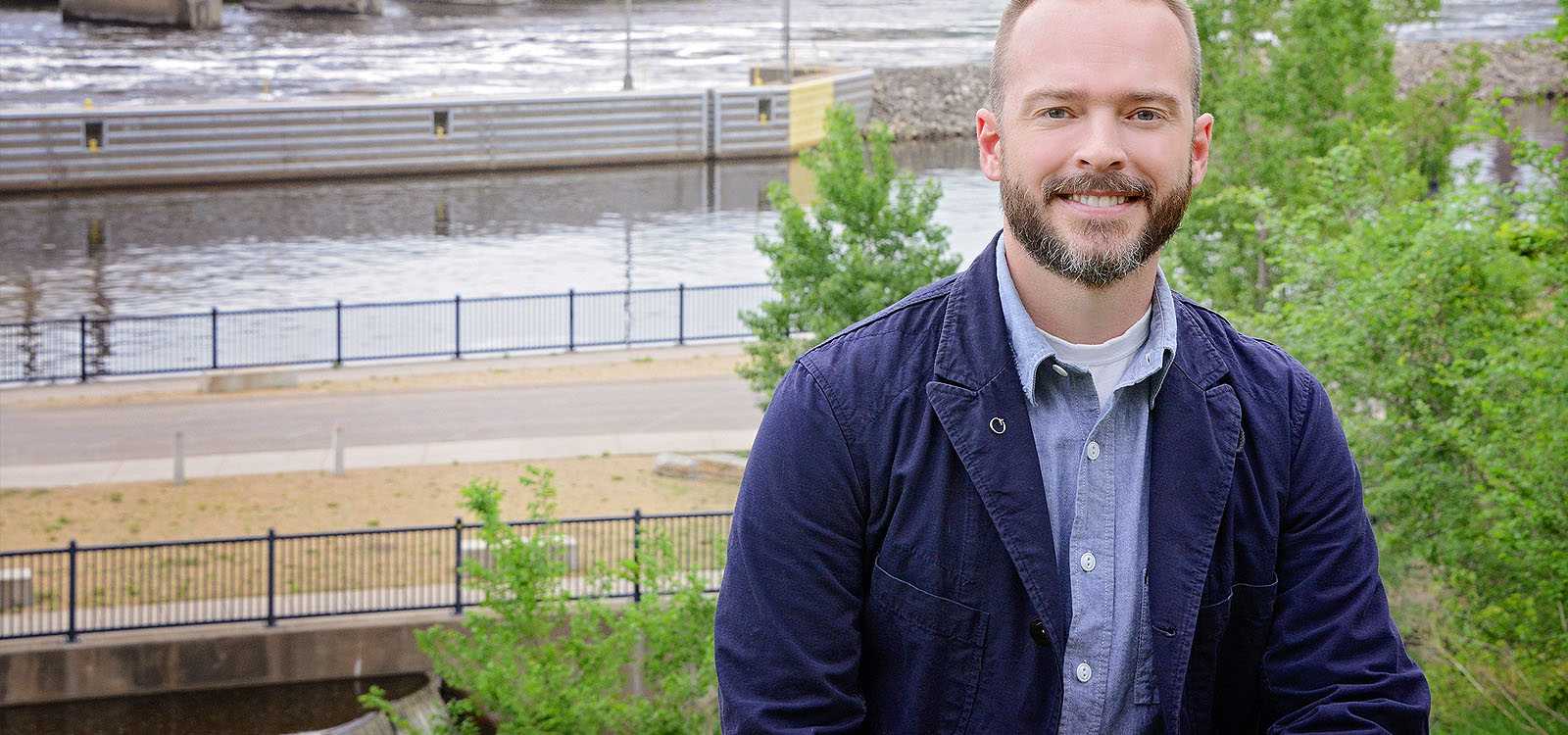 Career focused man standing near bridge