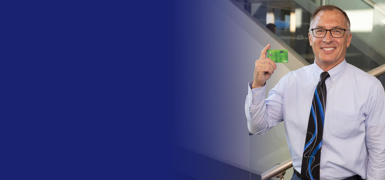 Business Member holding an RCU debit card